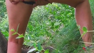Girl masturbating in the woods, almost surprised by a group of hikers