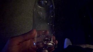 Pissing in a water bottle during a meeting