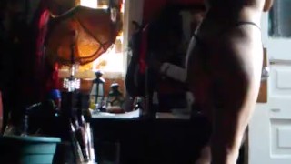 Lady dancing topless in heels!
