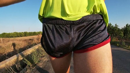 Tight shiny sport shorts bulging routine (freeballing in a public place)
