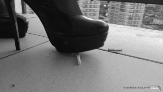 Mistress is smoke and crush cigarette