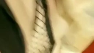 Goth girl in fishnets plays with her fat pussy
