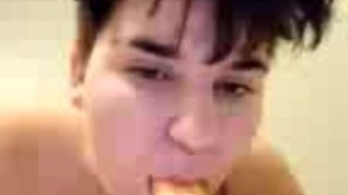 Sucking on dildo