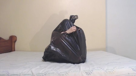 Getting out of a trash bag and fingering my pussy until i squirt big