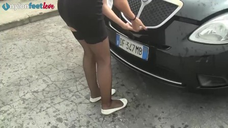 Sexy redhead stockings upskirt and shoeplay on the driveway