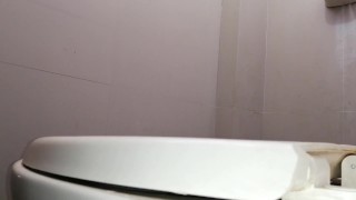I film my friend peeing standing up in my bathroom.