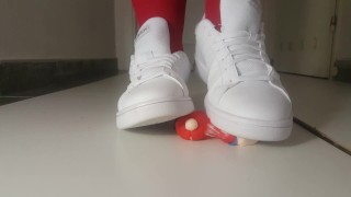 crushing little figurine