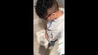 Twink with fat uncut cock piss at a rest stop toilet
