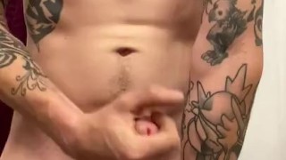 Tattooed male jerking off with dirty talk and moaning and cumming on hand 