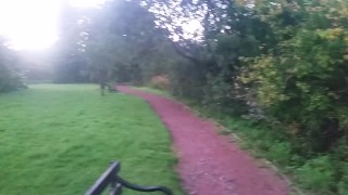 pissing into bin in the park