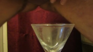 Cumming in a glass, ready to drink