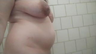 Pregnant wife shows her big boobs and pregnant belly in shower