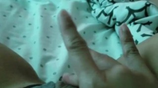 Teen fingers her pussy on camera 
