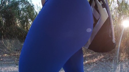 Getting erect while I walk in tight leggings in a public park