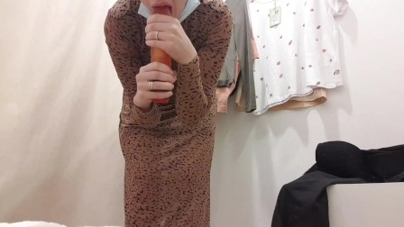 public Masturbation of a young bitch FeralBerryy with a Dildo in the fitting room