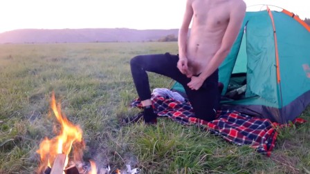 Guy drains weekly cum near campfire and tent