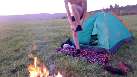 Guy drains weekly cum near campfire and tent