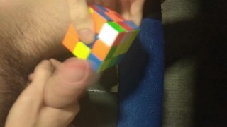 Man solves Rubik's Cube with penis