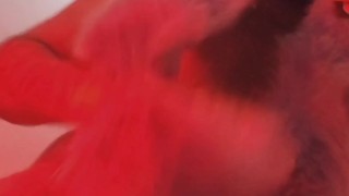 Red fluffy devil with a big uncut cock fills the mirror with cum 