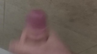 Uncut teen jacks off and cums on shower wall