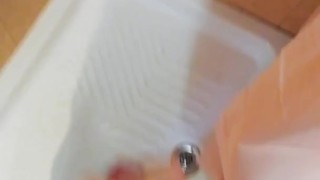 Redheaded cock beating in the shower