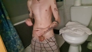 Skinny guy jerks off before taking a bath