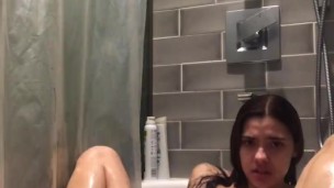 latina amateur teen masturbates and squirts in shower