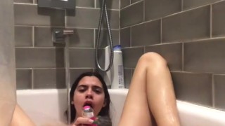 latina Amateur teen masturbates and squirts in shower