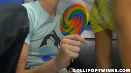 Horny twink Austin Tyler sucks on a thick cock and a lollipop