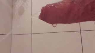 Red tight underwear pissing in the shower