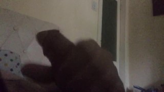 Masturbating