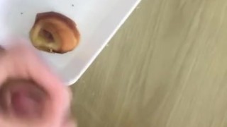 Adding the sauce to her snack