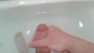 Sexy white boy plays with his beautiful dick