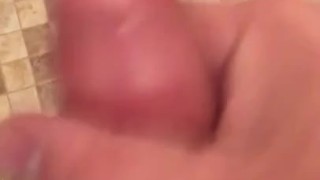 Hot Guy Shoots Big Cumshot from Uncut Cock in the Shower