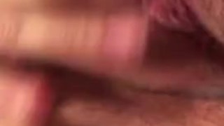 Masturbating