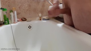 Russian teen with big dick pisses in the bathroom and cums