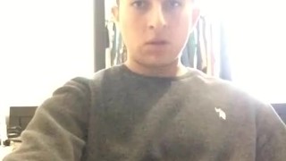 Solo male filling a condom with a huge load of cum. Tattooed man with a tasty big dick