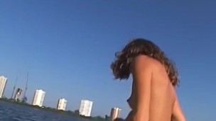 Sexy blonde fucks her husband and girlfriend on a boat