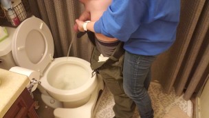 My girlfriend holds my dick and helps me pee pissing
