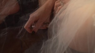 Horny bride playing with a glass dildo