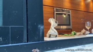busty brunette Quinn Finite naked in her kitchen