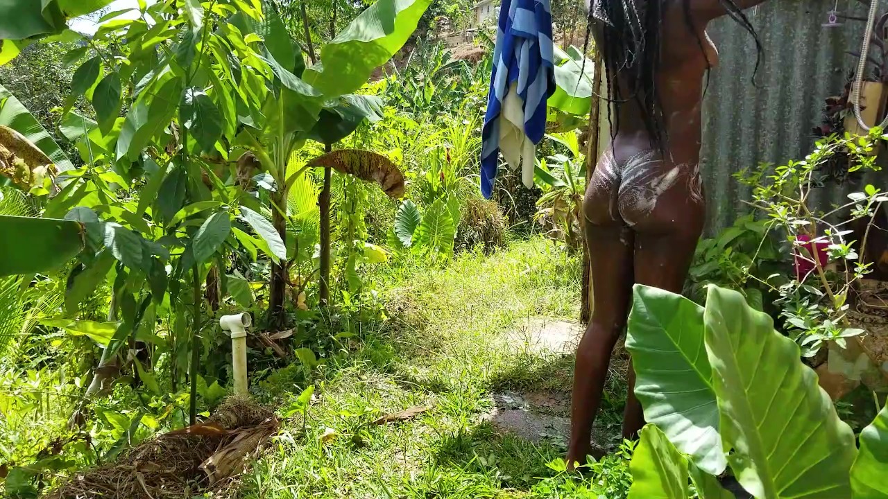 Black Beauty Sun Bathing In Public Showering Outdoors In Paradise