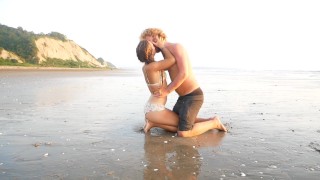 Real Couple Fucks Passionately on a Public Beach at the Pacific Ocean