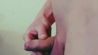 desperate twink pissing in a bottle