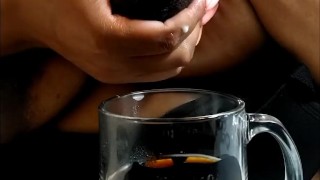 Mimi adds a little milk to her coffee