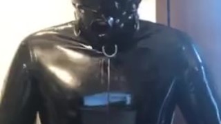 Full rubber gimp drools and wanks 