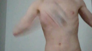 Boy playing Beat Saber while naked and hard