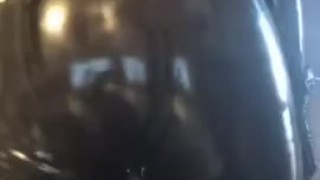 Full rubber gimp shows off suit and jerks off