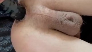 Shoving a 2 inch thick black dildo in my ass…