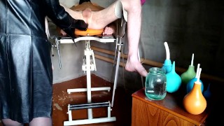 Mistress washes slave's ass with two different enemas
